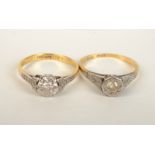 Two 18ct gold rings each illusion set a solitaire diamond.
