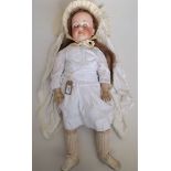 A good and large doll by Armand Marseille, the porcelain head with sleep eyes,