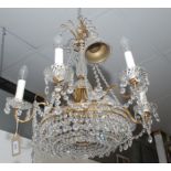 A cut glass and gilt metal six branch chandelier, 20th century, height 53cm.