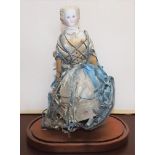 A 19th century porcelain head automaton doll,