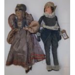 Two shorter 1920s or early 1930s boudoir dolls, one with moulded face, the other composition,