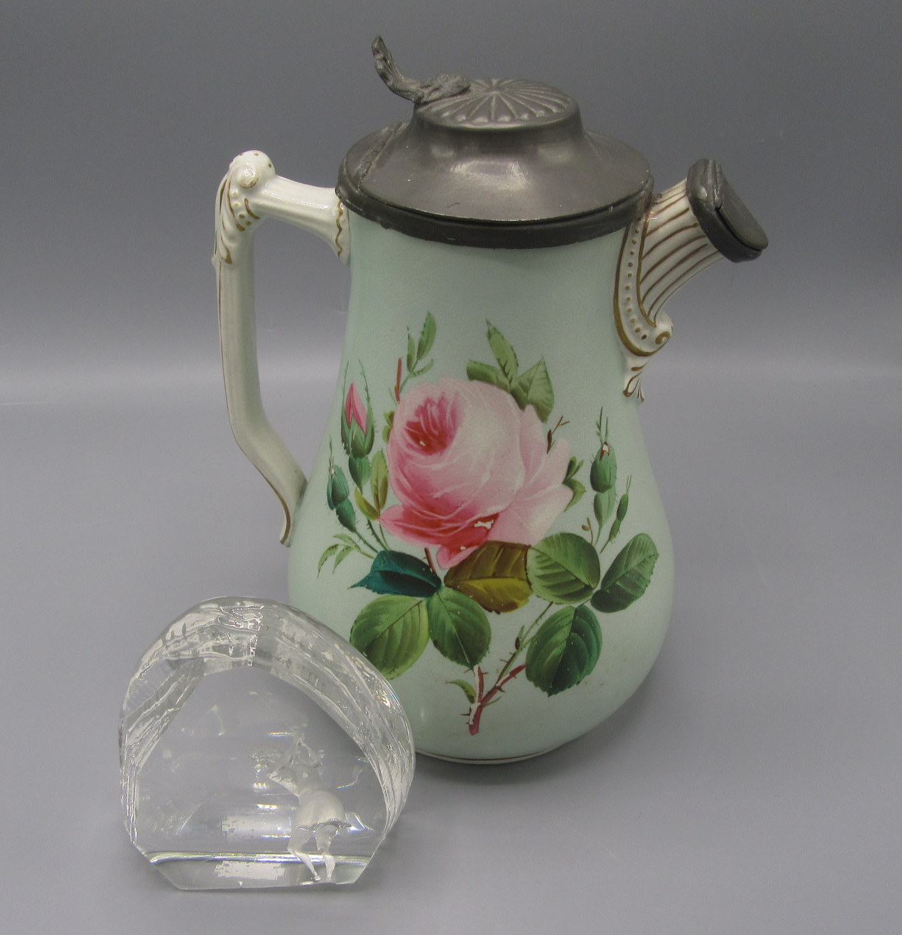 A Victorian New Hall pottery jug, with a pewter lid and spout cover, height 23.