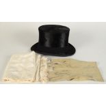 A silk top hat, inscribed 'G.A.