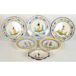 A set of three French faience Quimper plates, each decorated with a single figure in a landscape,