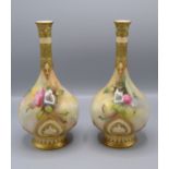 A pair of Royal Worcester porcelain vases, signed A Chidley, gilt decorated and painted with roses,