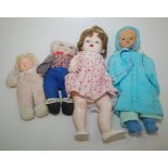 Four miscellaneous dolls including an all composition and a plastic doll by Pedigree.