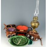 A brass oil lamp, height 29cm, four pairs of cased binoculars and three pottery dishes.