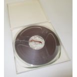 1 x 7 inch reel of boxed audio tape,