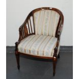 A late Victorian inlaid rosewood tub armchair,