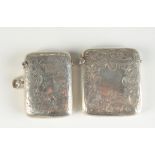 Two engraved silver vesta cases.