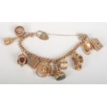 A 9ct gold charm bracelet, 72.3g.