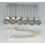 A set of six engraved silver teaspoons and a pair of similar sugar tongs. 3oz.