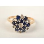 A 9ct gold blue and white stone cluster ring.