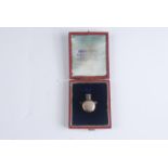 A miniature silver perfume bottle together with a medal box my Thomas Restall,