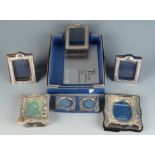 Six silver mounted photograph frames.