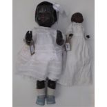 A small Heubach Koppelsdorf black baby doll,