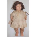 An all composition doll, the shoulder plate head with sleep eyes, open mouth and teeth,