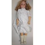 A porcelain head doll by Simon and Halbig for C.M.