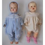 Two all composition dolls with a bent limb body, length of larger 26".
