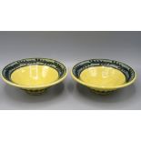 A pair of Paul Young slipware pottery bowls,