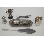 A quantity of silver plated items including a mustard pot and pepper pot.