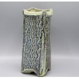 A Ruthanne Tudball polychrome glazed stoneware vase, of square form, height 23cm.
