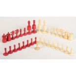 A Victorian ivory chess set, height of kings 9cm, of natural and red stained ivory,