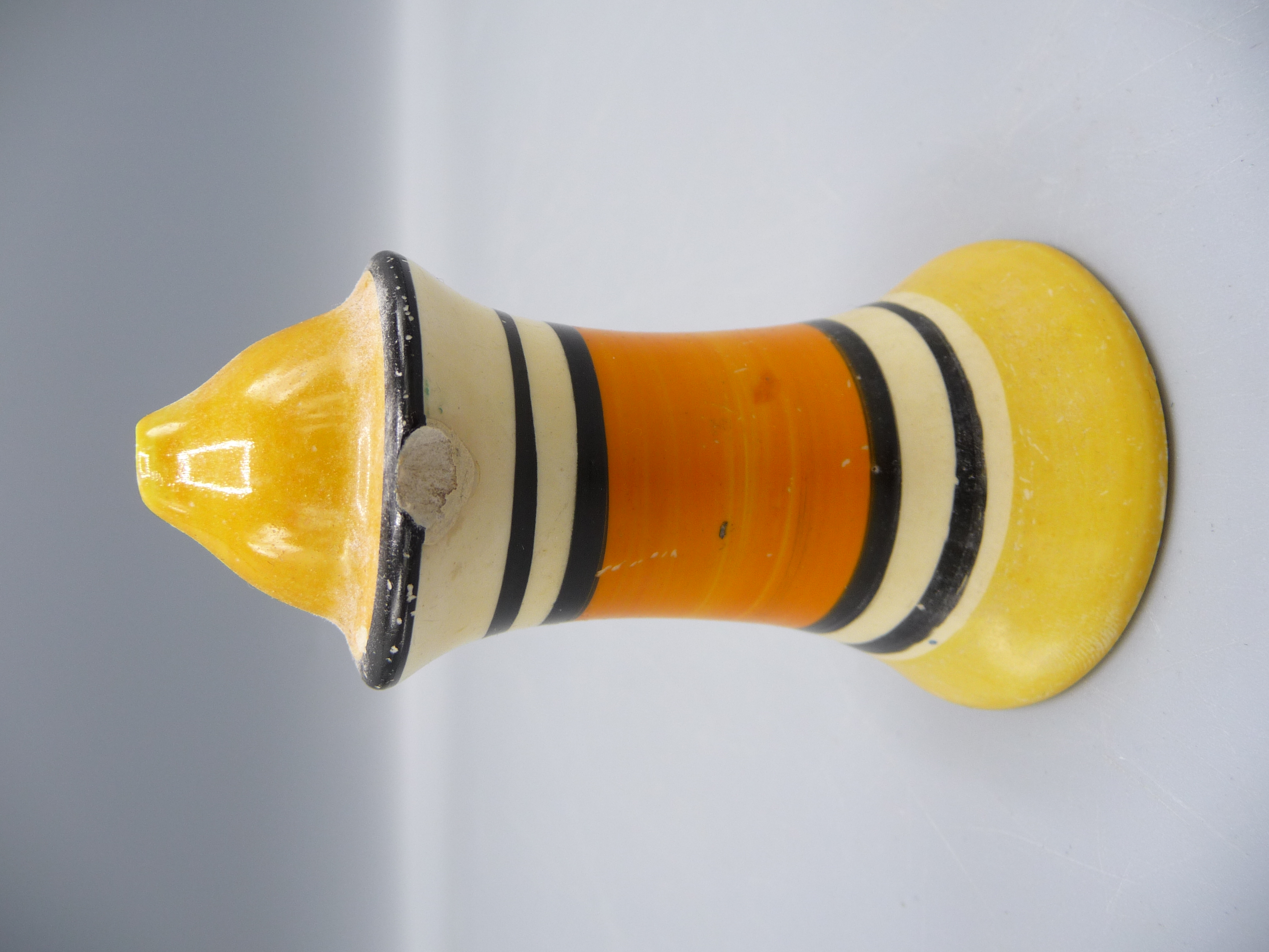 A pair of Clarice Cliff salt and pepper pots, height 8.5cm, two cream jugs and four egg cups. - Image 2 of 5