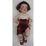 A French porcelain head doll, the head with sleep eyes, closed mouth and teeth,
