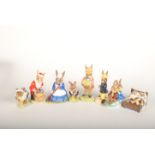 Eight Royal Doulton Bunnykins figures, comprising 'Santa DB17', 'Billie & Buntie Sleigh Ride DB4',