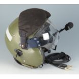 A pilot's flying helmet with leather inner and built in headphones,