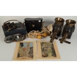 A pair of Leitz Wetzlar military binoculars, leather hat and goggles,