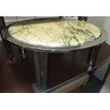 A modern circular chrome coffee table with a green veined cream marble top, diameter 77.5cm.
