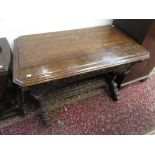 A carved oak centre table, early 19th century,