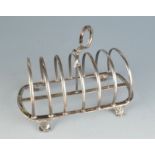 A late Victorian silver toast rack, Sheffield 1892. 8.3oz.