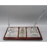 A Waterford Crystal desk set, with wooden stand, length 30.5cm depth 13cm.