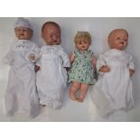 Three all composition dolls, each with bent limb body,