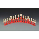 A Victorian carved and red stained ivory Staunton chess set, by Jacques, London,