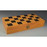 A South East Asian style chess set, with velvet lined fitted box and board, height of king 10.2cm.