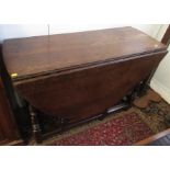 An oak gateleg dining table, early 18th century,