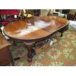 A George III style mahogany extending dining table, early 20th century,