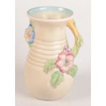 A Clarice Cliff vase, floral decorated, no 907, height 22.5cm.