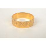 A 22ct gold band by Bjorn Weckstrom & Son, London 1967, 3.8g.