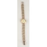 A lady's 9ct gold cased Accurist wrist watch on 9ct gold bracelet.