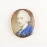 A good 18th century miniature portrait of a gentleman with blue frock coat and powdered wig,