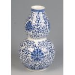A Chinese blue and white porcelain double gourd vase, 20th century, height 22cm.