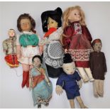 Seven miscellaneous dolls, including plastic, rubber and composition.