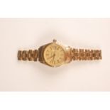 A Rolex style high purity gold ladies quartz date wristwatch the dial signed Geneva.