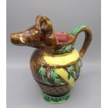 A majolica jug, the spout in the form of a boars head,