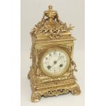A French brass mantle clock, 19th century,